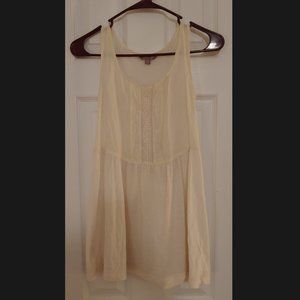 Delicate off-white tunic-style top